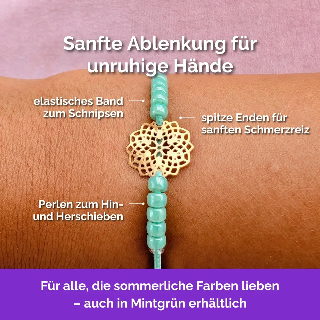 Blume Fidget Armband goldfarben mintgrün mit beweglichen Perlen für Erwachsene, ideal als Skill bei innerer Unruhe zur sanften Stressbewältigung und Emotionsregulierung.