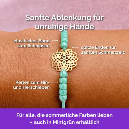 Blume Fidget Armband goldfarben mintgrün mit beweglichen Perlen für Erwachsene, ideal als Skill bei innerer Unruhe zur sanften Stressbewältigung und Emotionsregulierung.