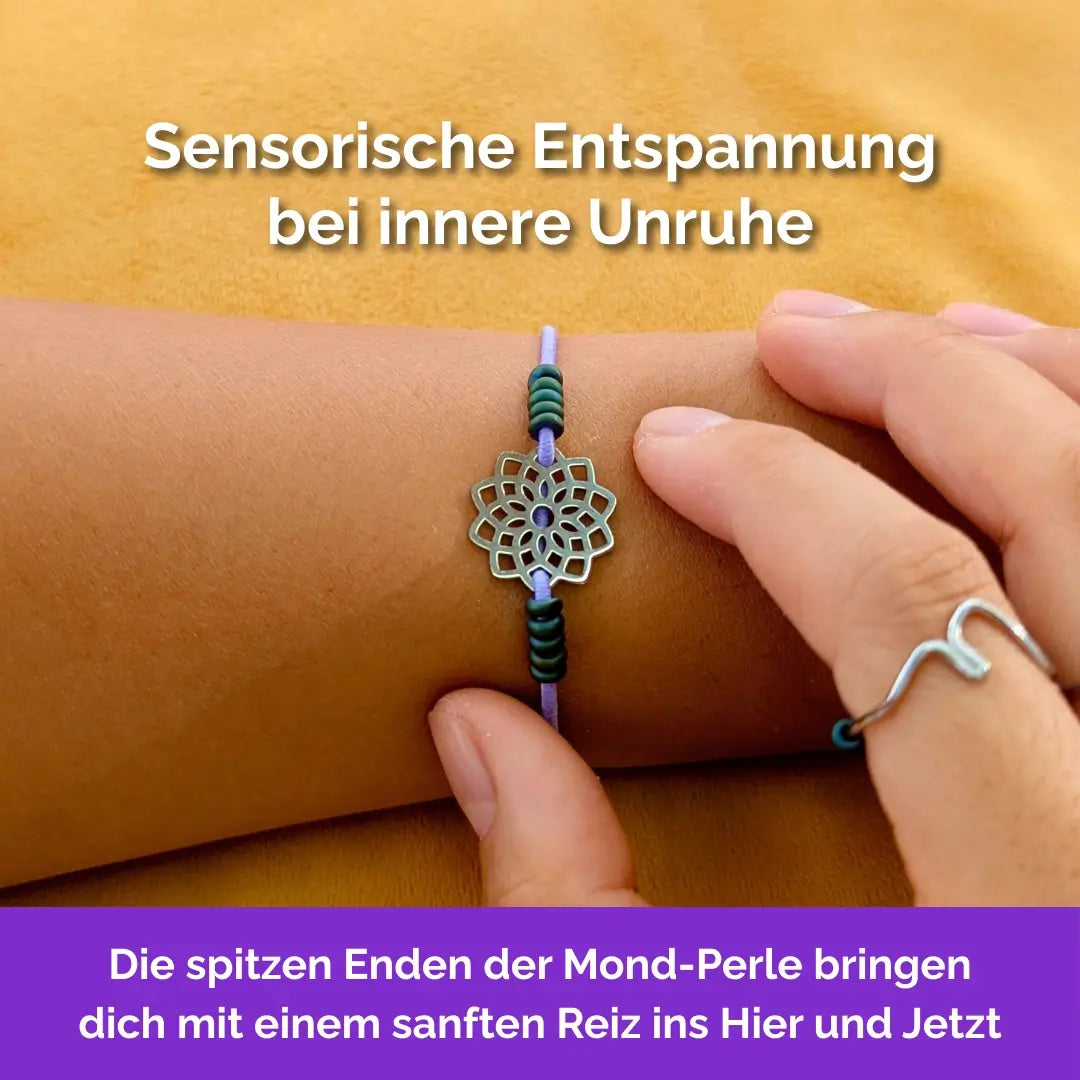 Lotus Fidget Armband in Silber Lavendel mit beweglichen Perlen für Erwachsene, ideal als Gummiband Skill bei innerer Unruhe zur sanften Stressbewältigung und Emotionsregulierung.