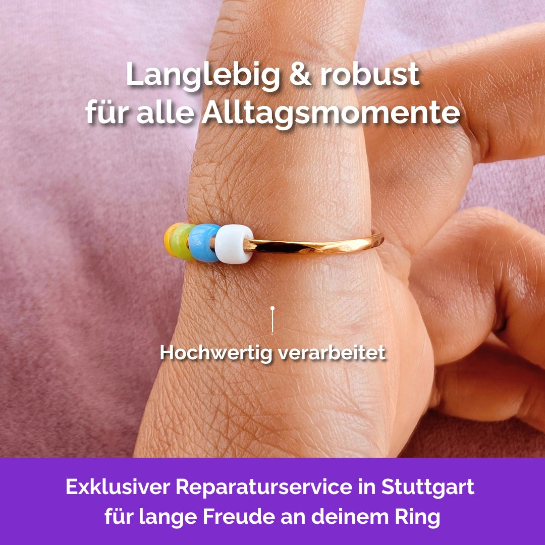Fidget Ring goldfarben – Bunt, Größe 57